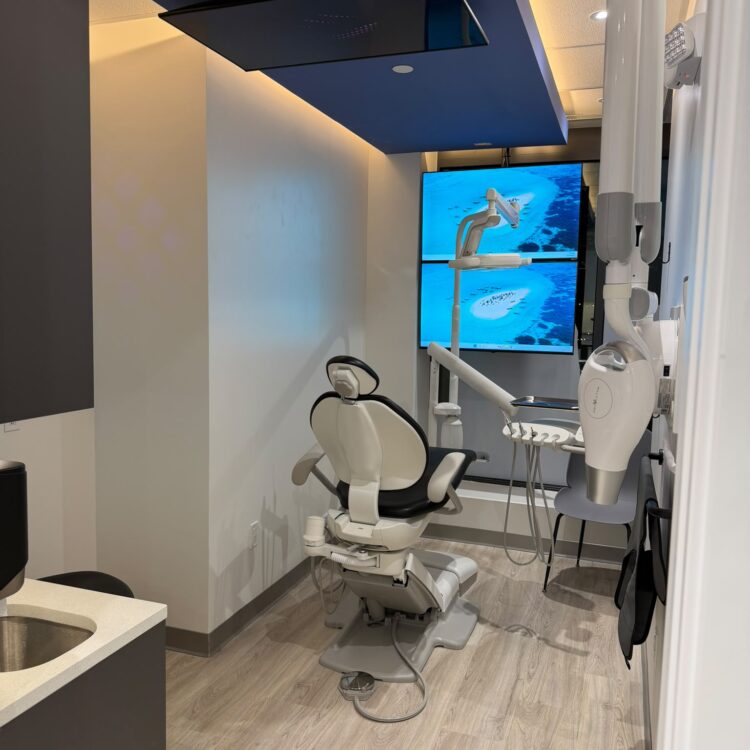 Dental operatory with a wall-mounted digital X-ray unit at Smili Dental North Vancouver